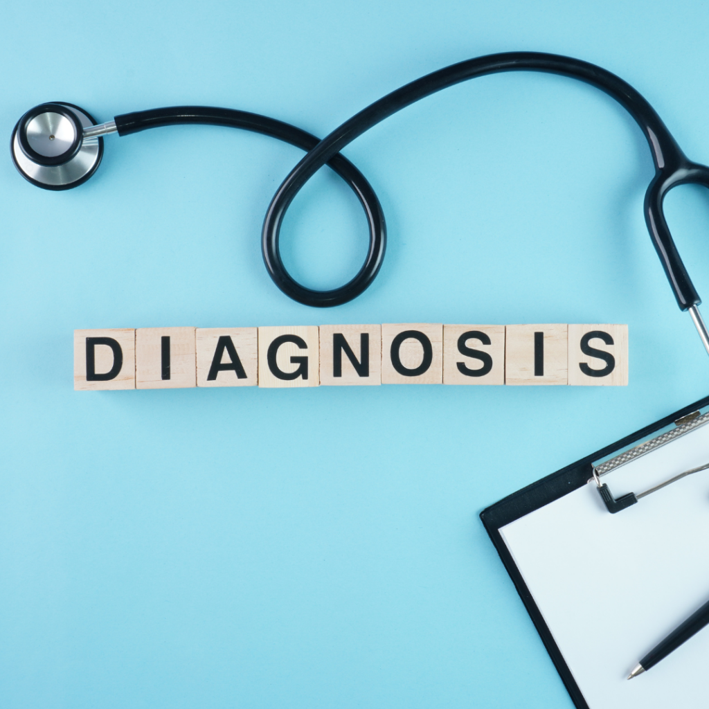 photo of the word diagnosis spelled with wooden cubes and Stethoscope